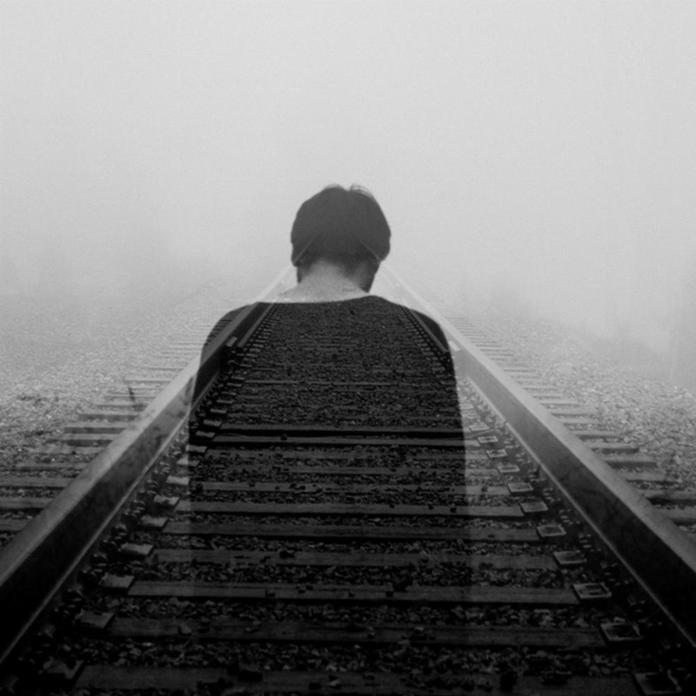 Sad Boy on Railway Track DP Image